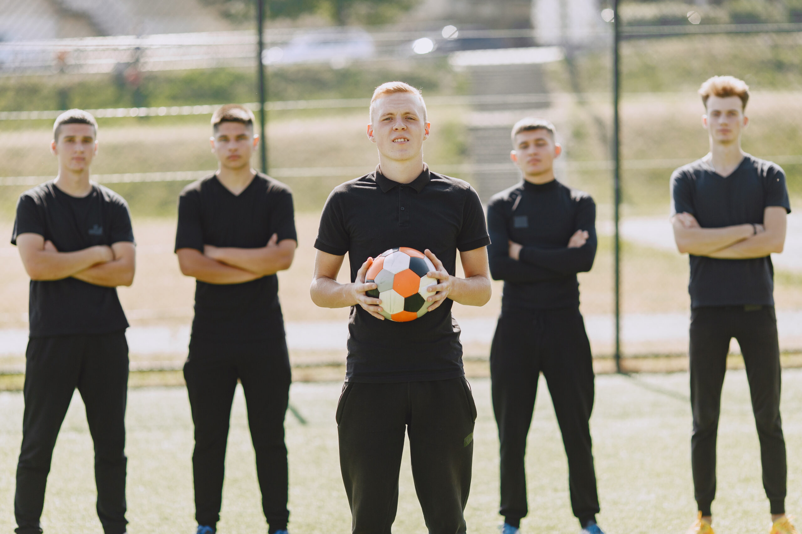 men-play-socer-park-tournament-mini-footbal-guy-black-sportsuits-2-scaled.jpg
